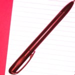red pen & notepad